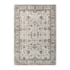Natural rectangular rug featuring an intricate vintage-inspired floral pattern in soft beige, brown and grey tones with a distressed finish and decorative border, 160 x 230cm.