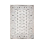 Design Republique Rihana Textured Ivory Rug featuring a delicate repeating floral motif in soft grey and ivory tones, framed by an intricate geometric and decorative patterned border.