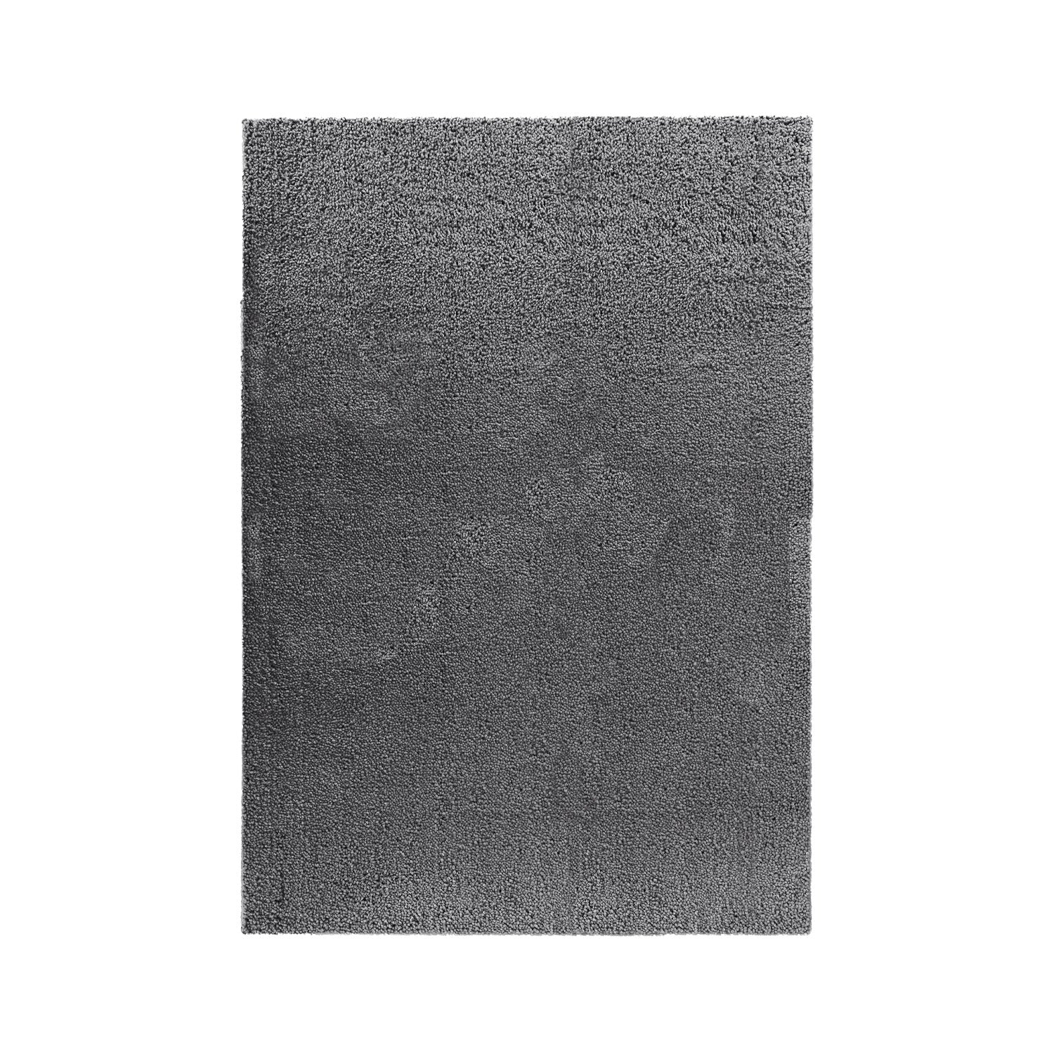 A rectangular dark gray shag rug shown from a top-down view on a solid white background.