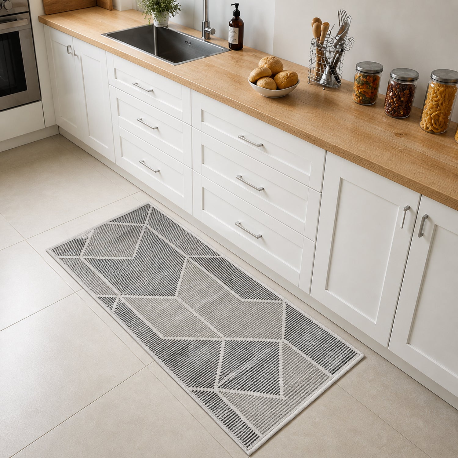 Luxury Living Serenity Geometric Rug 70 x 140cm in Multi Coloured, displayed as a runner in a modern kitchen with the same abstract geometric pattern.