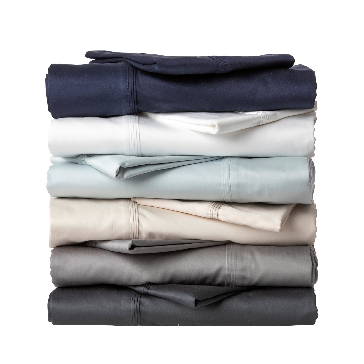 A neatly stacked collection of silky sheet sets in assorted neutral and contemporary colours showcases their smooth finish and elegant stitched cuff detailing.