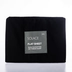 Black flat sheet with a label on a white background