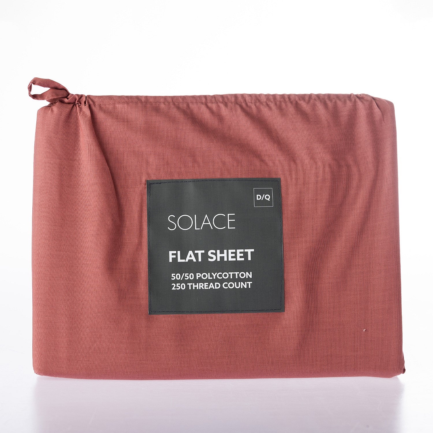 Red flat sheet with a label on a white background