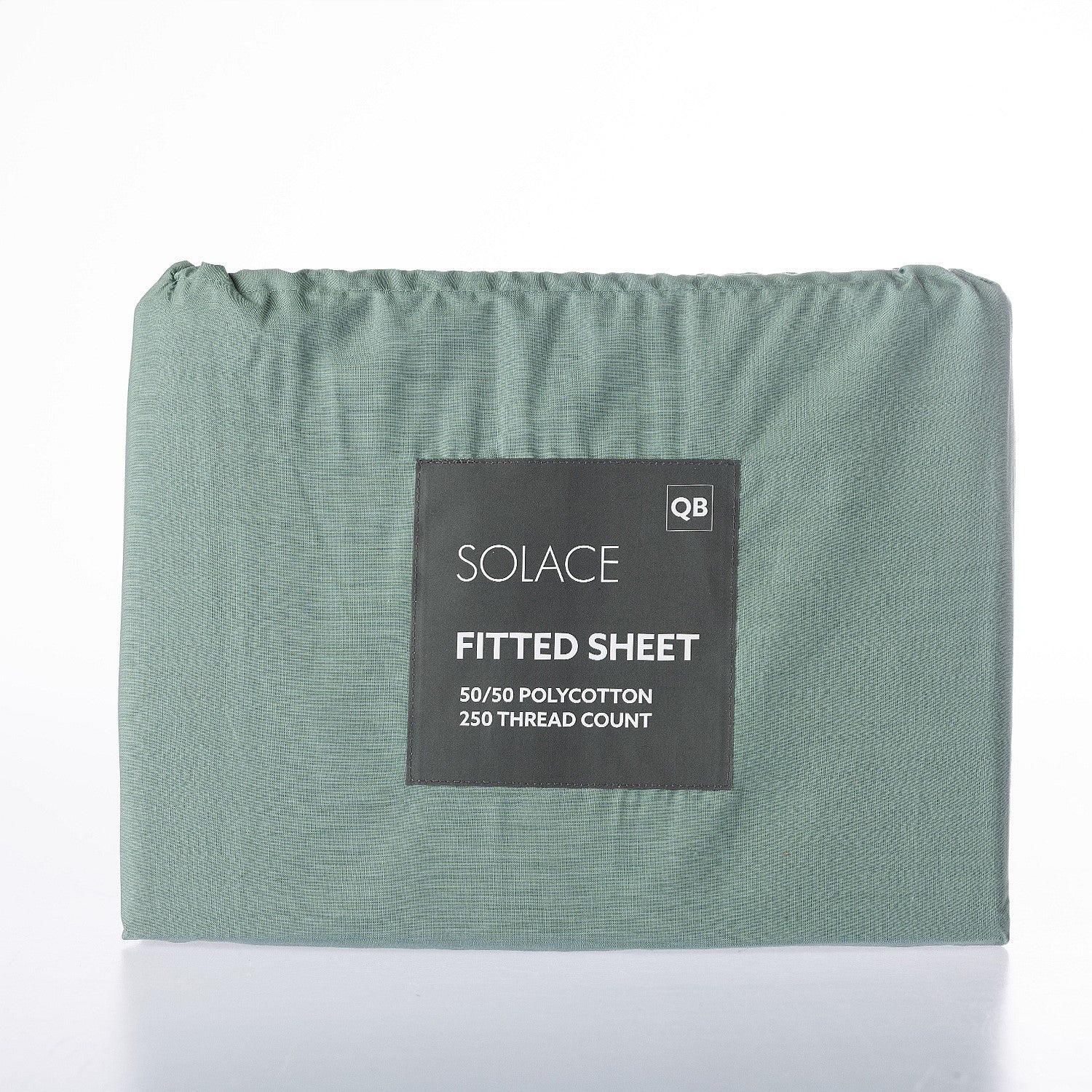 Green fitted sheet with a label on a white background