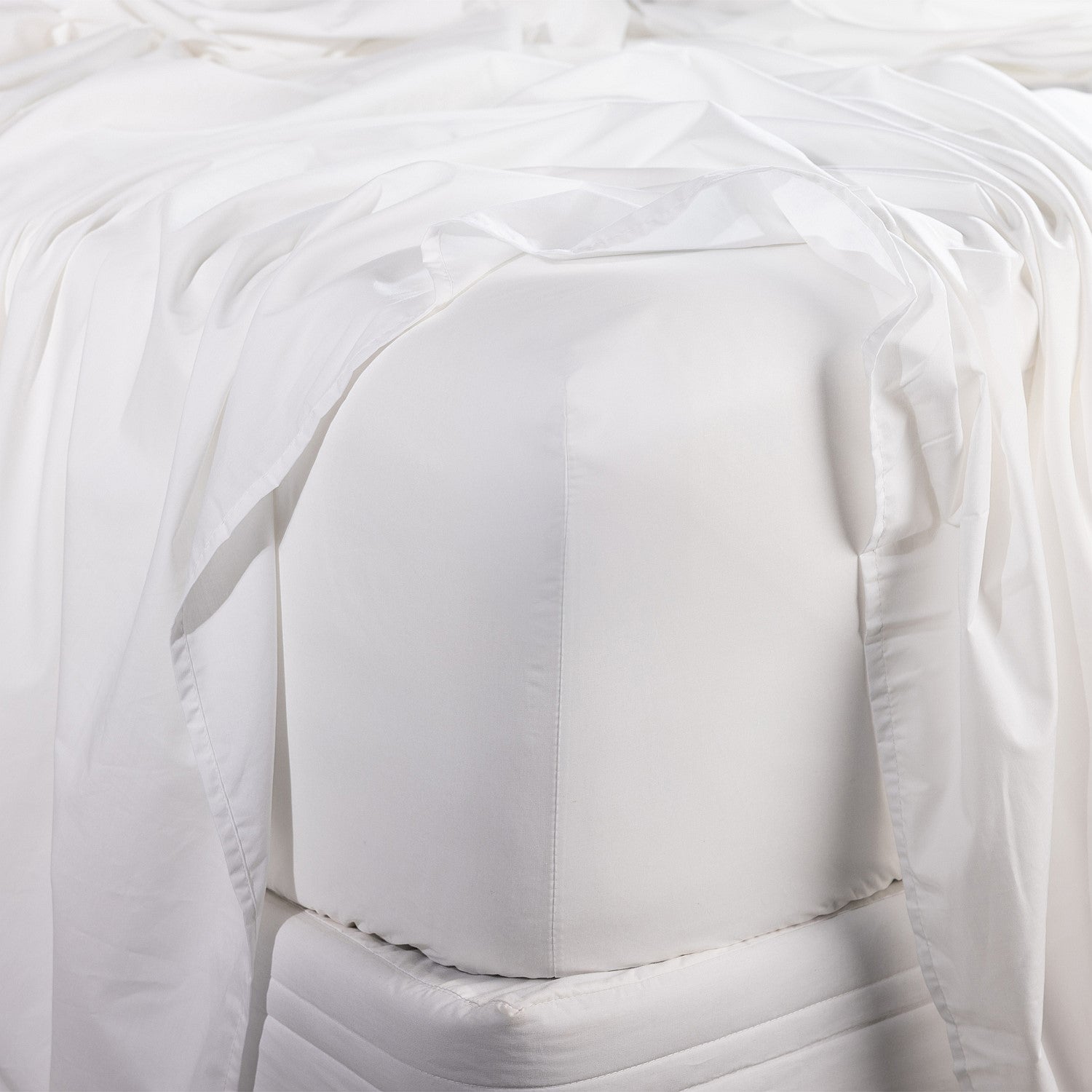 Close-up of a white fitted sheet