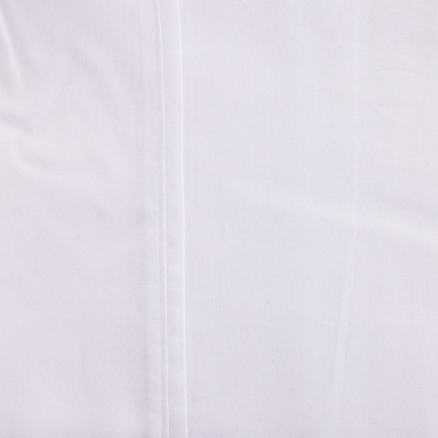 Close-up of a white shirt with a subtle pattern