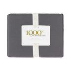 A beautifully packaged 1000 thread count fitted sheet is presented with a reusable branded storage band and elegant sleeve, combining premium presentation with practical organisation.