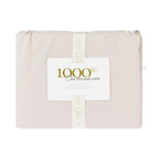 A beautifully packaged 1000 thread count fitted sheet is presented with a reusable branded storage band and elegant sleeve, combining premium presentation with practical organisation.