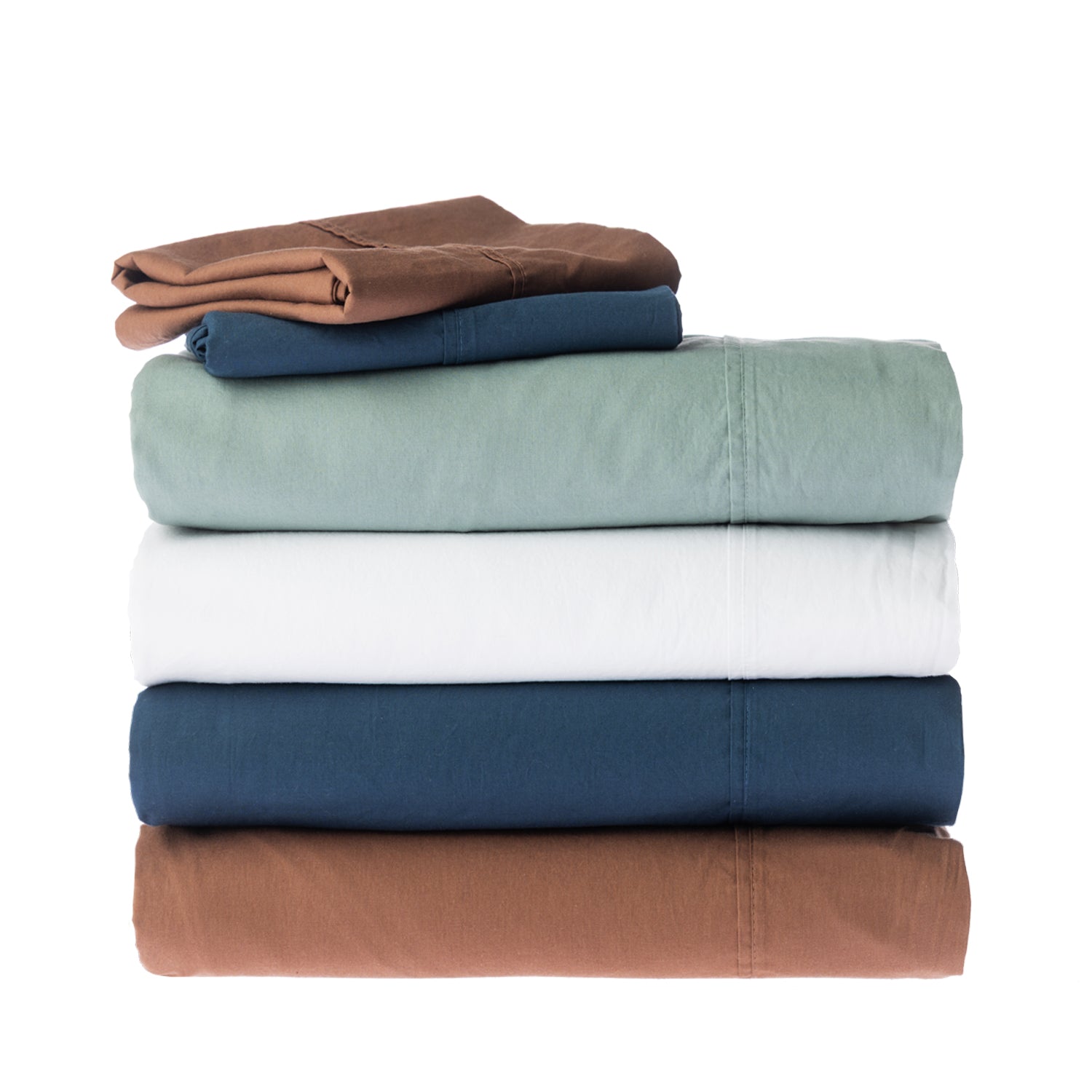 Design Republique Quinn 100% Cotton Washed Sheet Set in White, styled on a bed with layered white bedding and coordinating pillowcases.