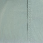 Design Republique Quinn 100% Cotton Washed Sheet Set in Sage Eucalyptus, styled on a bed with matching sheets and pillowcases.