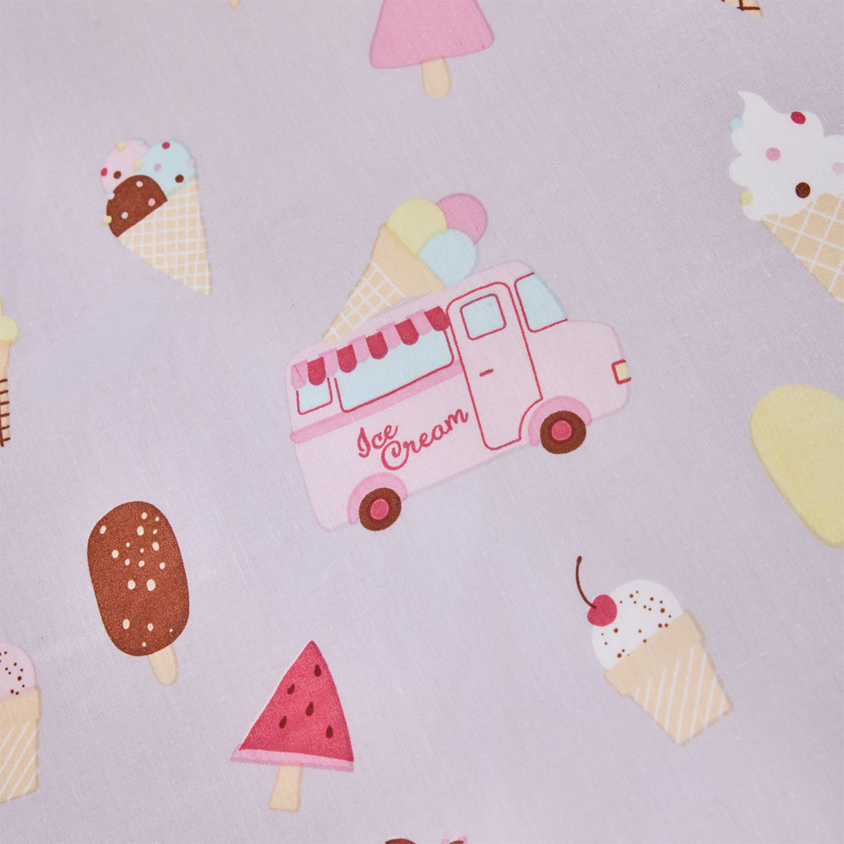 Close-up of the Ice Cream Shop fabric print featuring ice cream cones, popsicles, sundaes, watermelon-shaped treats and a pink ice cream truck on a lilac background.