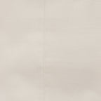 A close-up of a almond textured fabric with a subtle vertical seam.