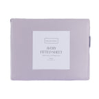 A folded Gracious Living Avery 750TC 100% Cotton Fitted Sheet in Dusky Mauve, featuring soft lavender-purple cotton fabric and a branded product label, displayed against a white background.