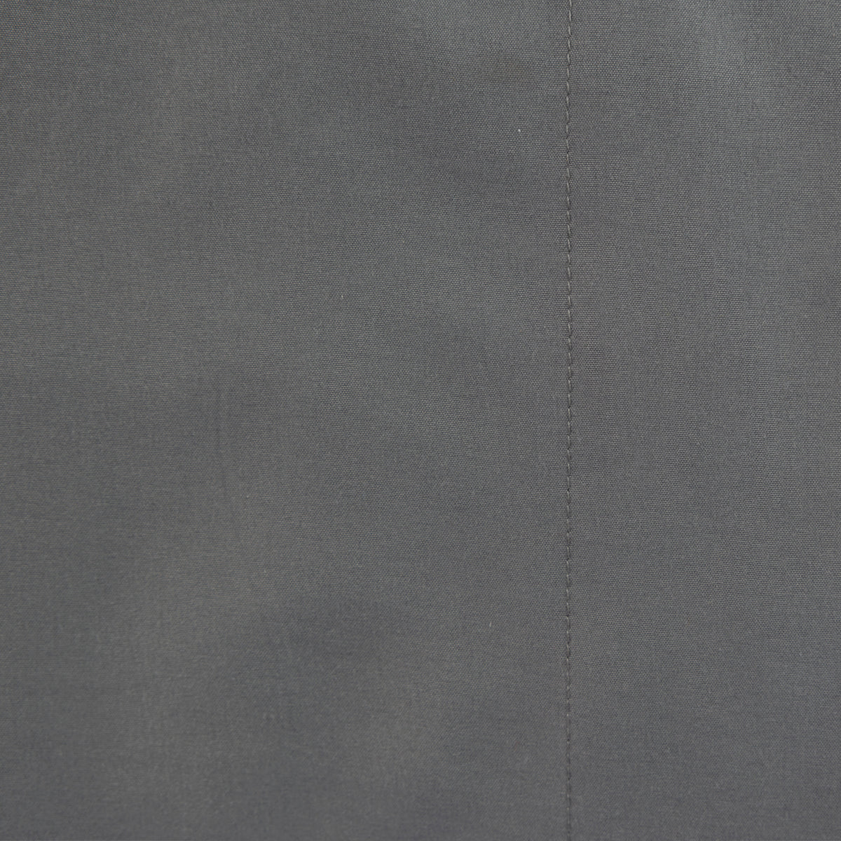 Close-up of the Home Co. Soft Touch Easy Care Sheet Set in Charcoal, showing the smooth fabric and stitched seam.