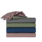 Home Co. Soft Touch Easy Care Sheet Sets in Charcoal, Olive, Navy and Rosewood, folded and stacked together.