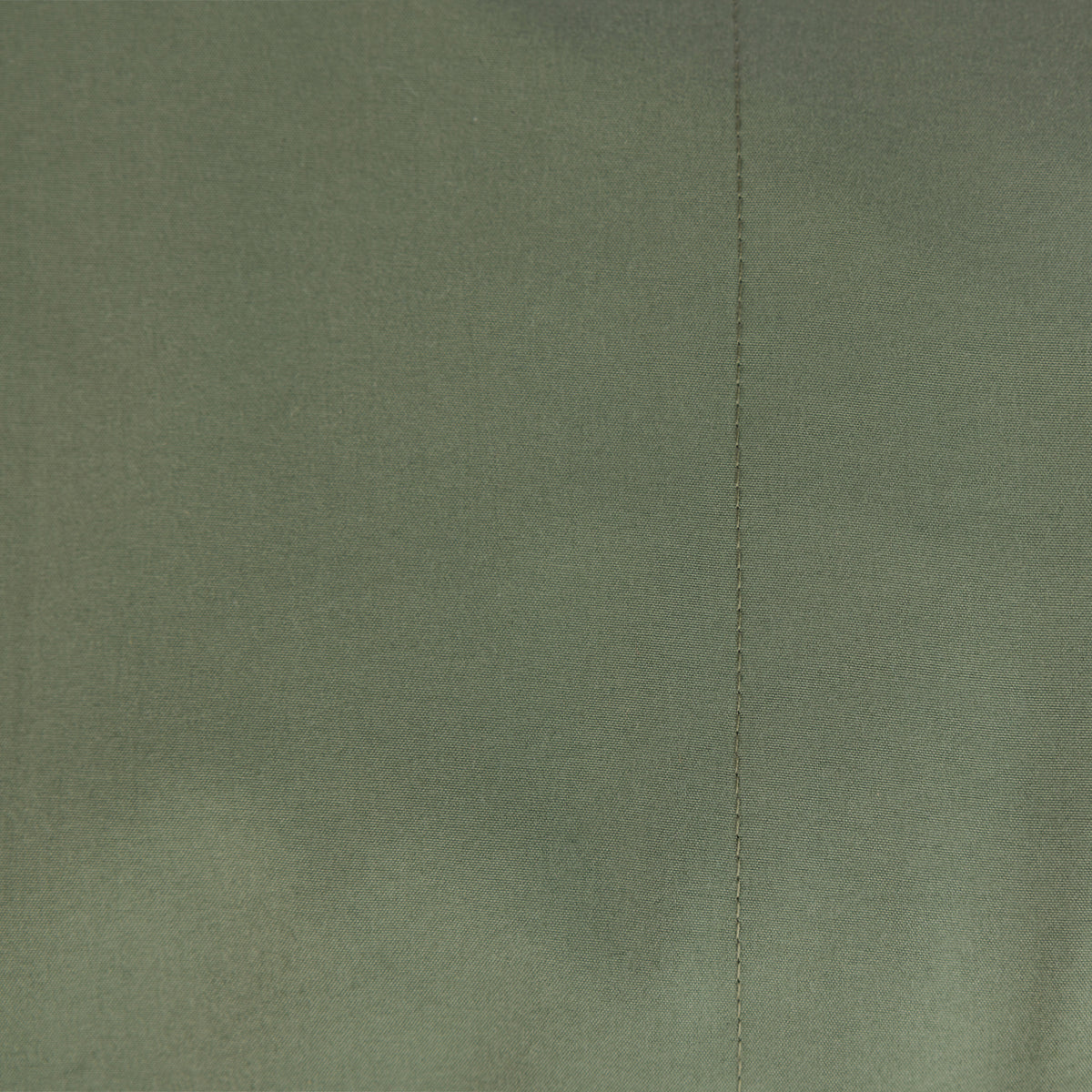 Close-up of the Home Co. Soft Touch Easy Care Sheet Set in Olive, showing the smooth fabric and stitched seam.