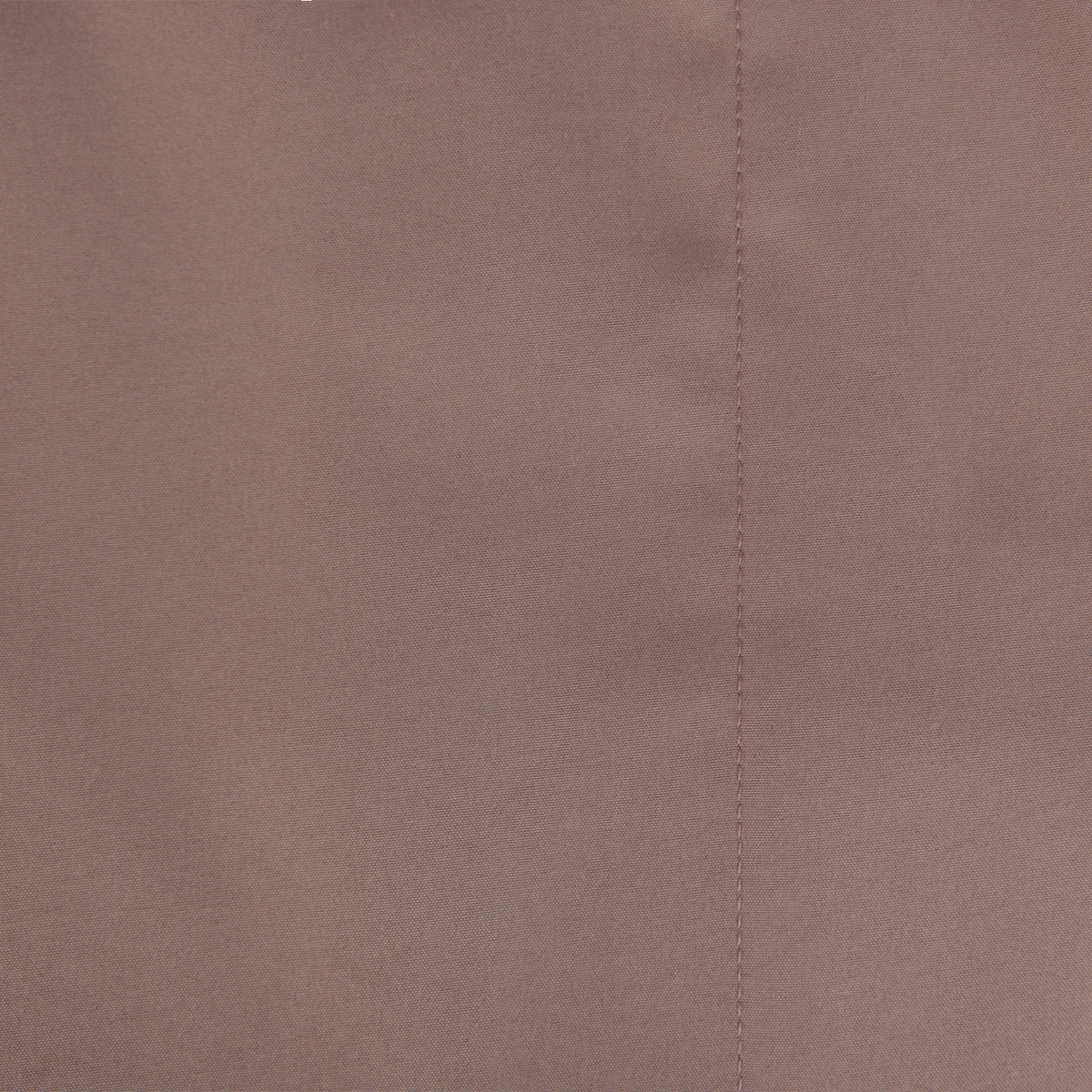 Close-up of the Home Co. Soft Touch Easy Care Sheet Set in Rosewood, showing the smooth fabric and stitched seam.