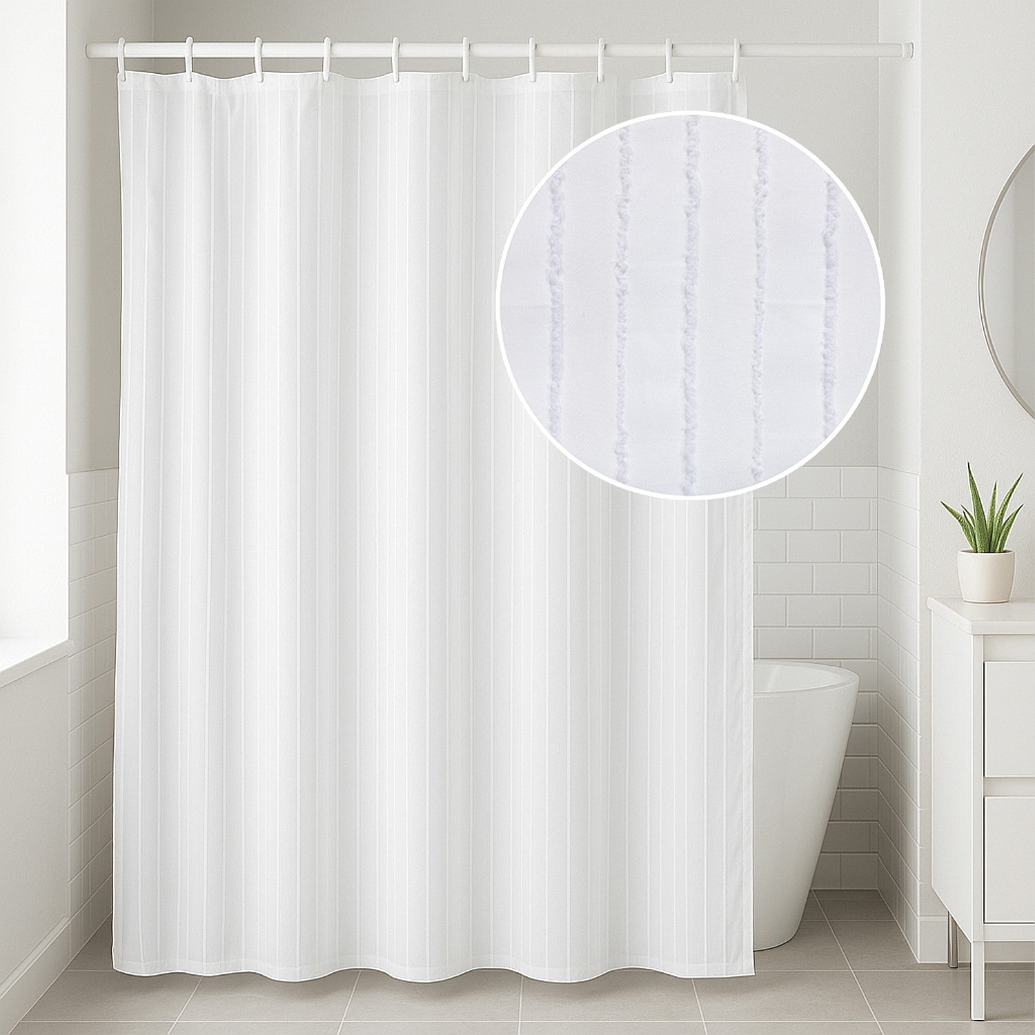 White satin stripe shower curtain hanging in a modern bathroom with a white bathtub.