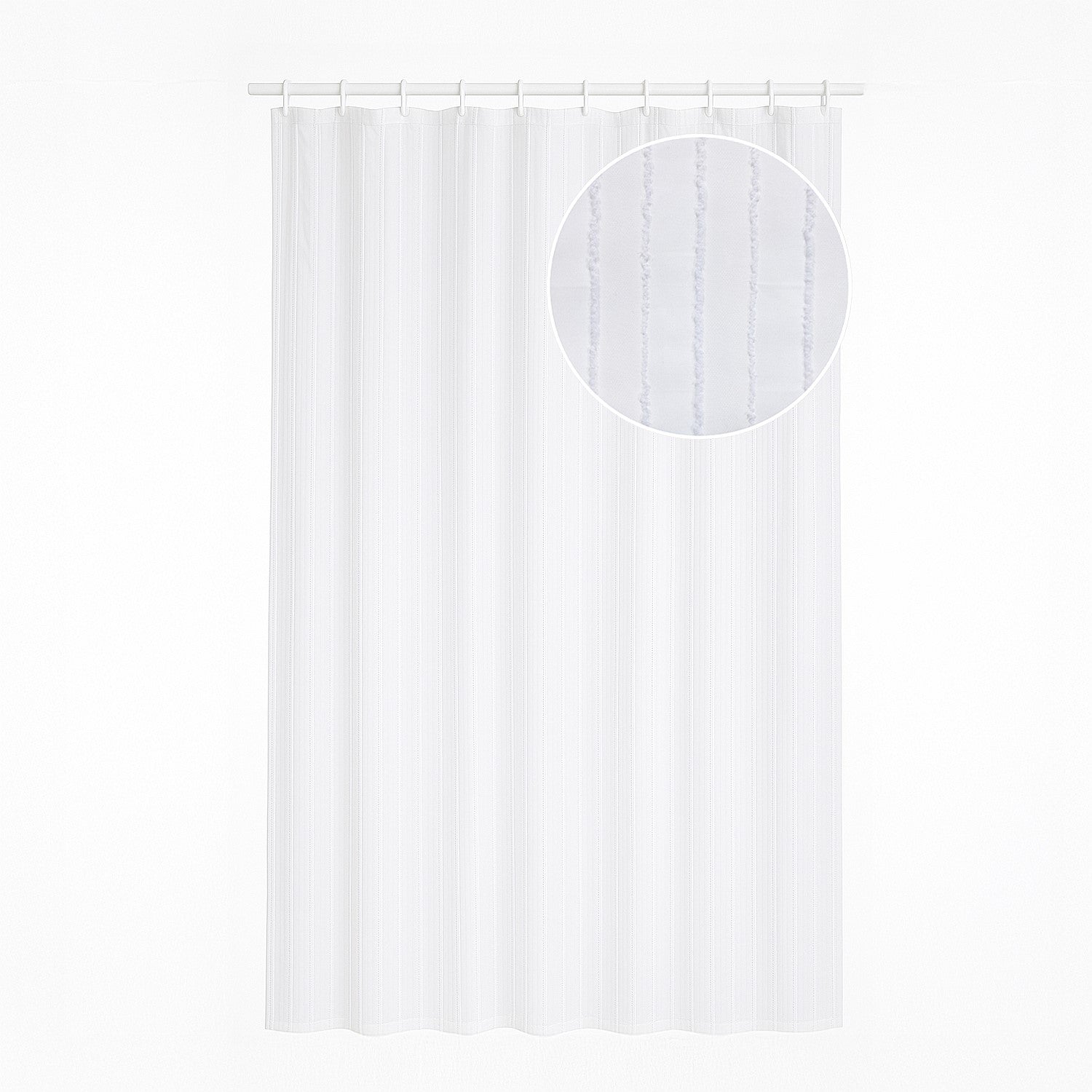 White satin stripe shower curtain hanging.