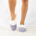 Person wearing Solace Chenille Faux Fur Trim Slippers in Lilac, featuring a soft chenille upper with plush white faux fur trim.