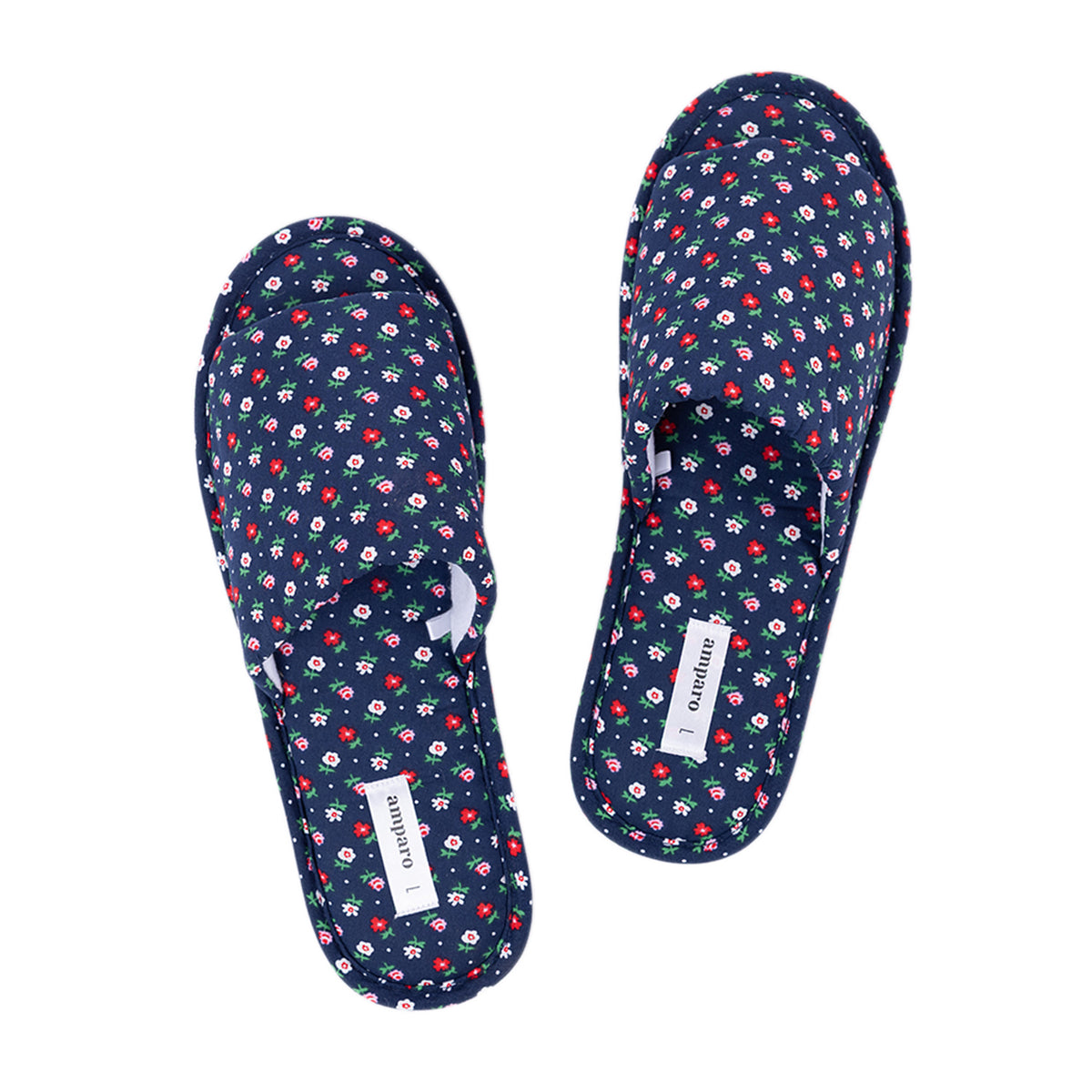 Pair of navy open-toe slippers with a small multicoloured floral print displayed on a white background.