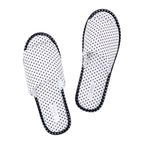 Pair of Solace Gracie Quilted Slippers White featuring an all-over black polka dot print and contrasting black trim.
