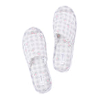 Pair of Solace Gracie Quilted Slippers Grey featuring a gingham check and delicate pink floral print.