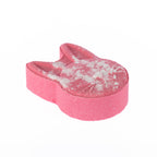 Pink bunny-shaped bath fizzer with embossed facial details, scented in Freesia.