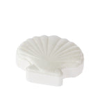 Grace & Gild Scallop Shell Bath Fizzer 100g in white, shaped like a fan shell with raised curved ridges and a soft pearlescent finish.