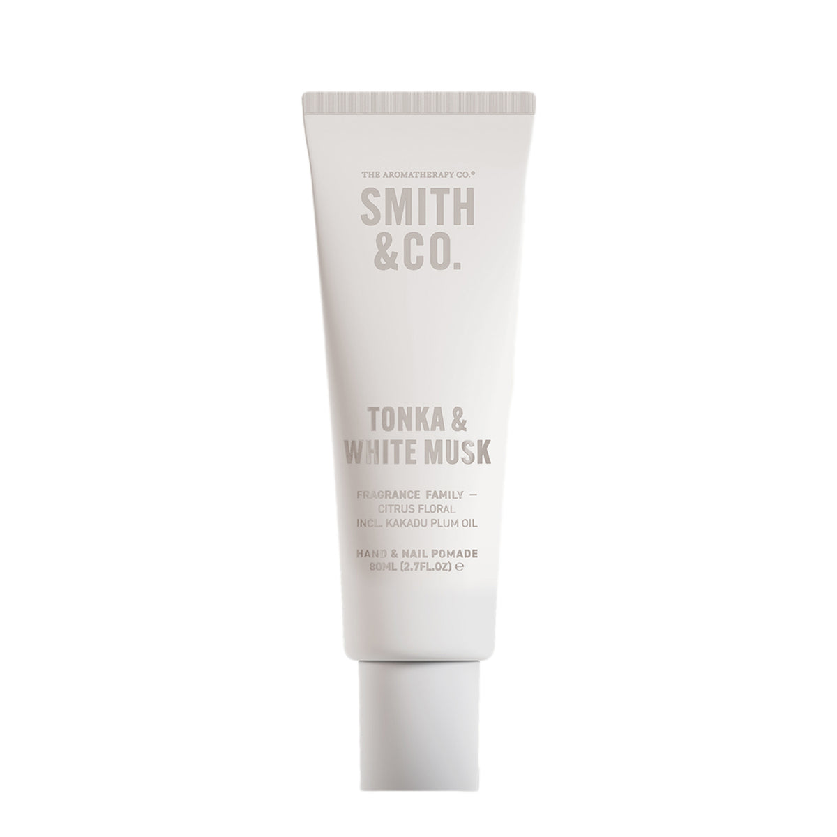 A white squeeze tube of Smith & Co. Tonka & White Musk hand and nail pomade, centered on a plain white background.