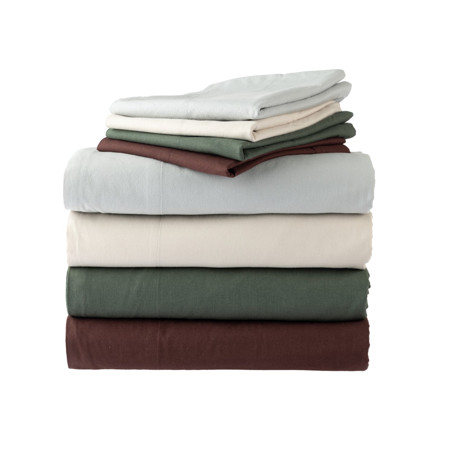 A stack of six folded bedding sheets in muted colors, including light blue, cream, olive green, brown, off-white, and dark brown, arranged neatly on a solid white background.