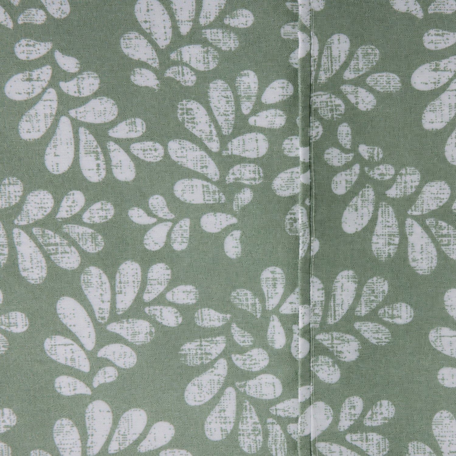 Close-up of the Home Co. Florance Olive printed sheet set with a white abstract leaf print on an olive green background.
