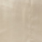 Close up of the Design Plus Duke Sheet Set in Beige, showing the plain cotton fabric texture.