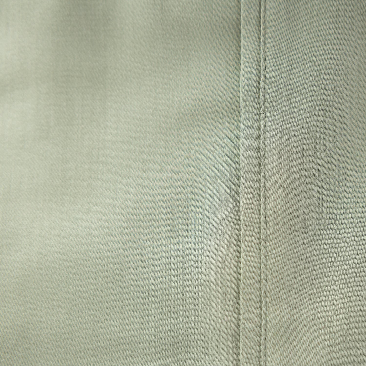 green sheet laid out up close.