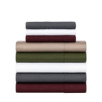 Folded Solace Satin Sheet Sets stacked together in White, Charcoal, Berry, Stone and Olive colourways.