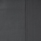 Close-up of the Home Co. Ella Cotton Sheet Set in Charcoal, showing the dark grey woven fabric and stitched seam detail.