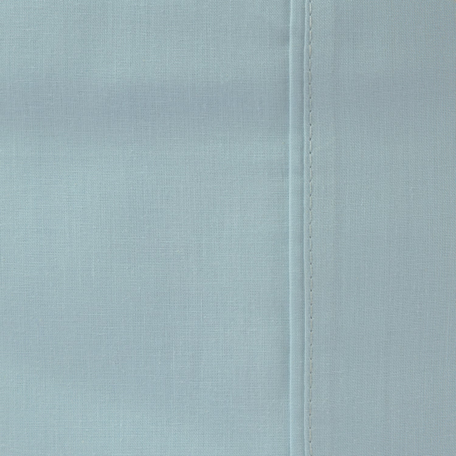 Close-up of the Home Co. Ella Cotton Sheet Set in Sky Blue, highlighting the soft blue colour, woven texture and seam detail.