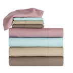 Folded Home Co. Ella 180TC Cotton Sheet Sets stacked together in Dusky Mauve, Sky Blue, Stone and Mocha.