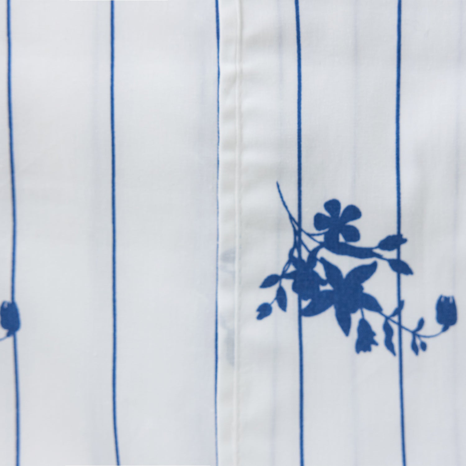 Pure & Simple Nova Printed Sheet Set in Blue packaged with matching fabric bag, featuring navy stripes and floral detailing.