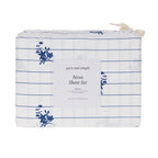 Close-up of the Pure & Simple Nova Printed Sheet Set in Blue, featuring navy vertical stripes with delicate floral motifs on a white background.