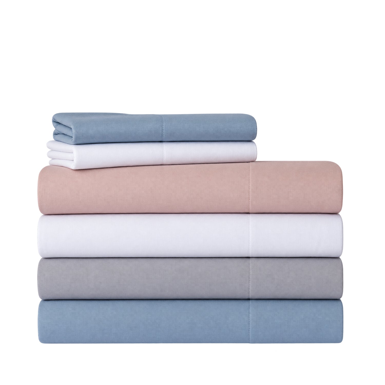 A stack of four folded bedding sheets in muted pastel colors, including blue, pink, gray, and white, arranged neatly on a solid white background.