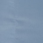 A close-up of a blue sheet. 