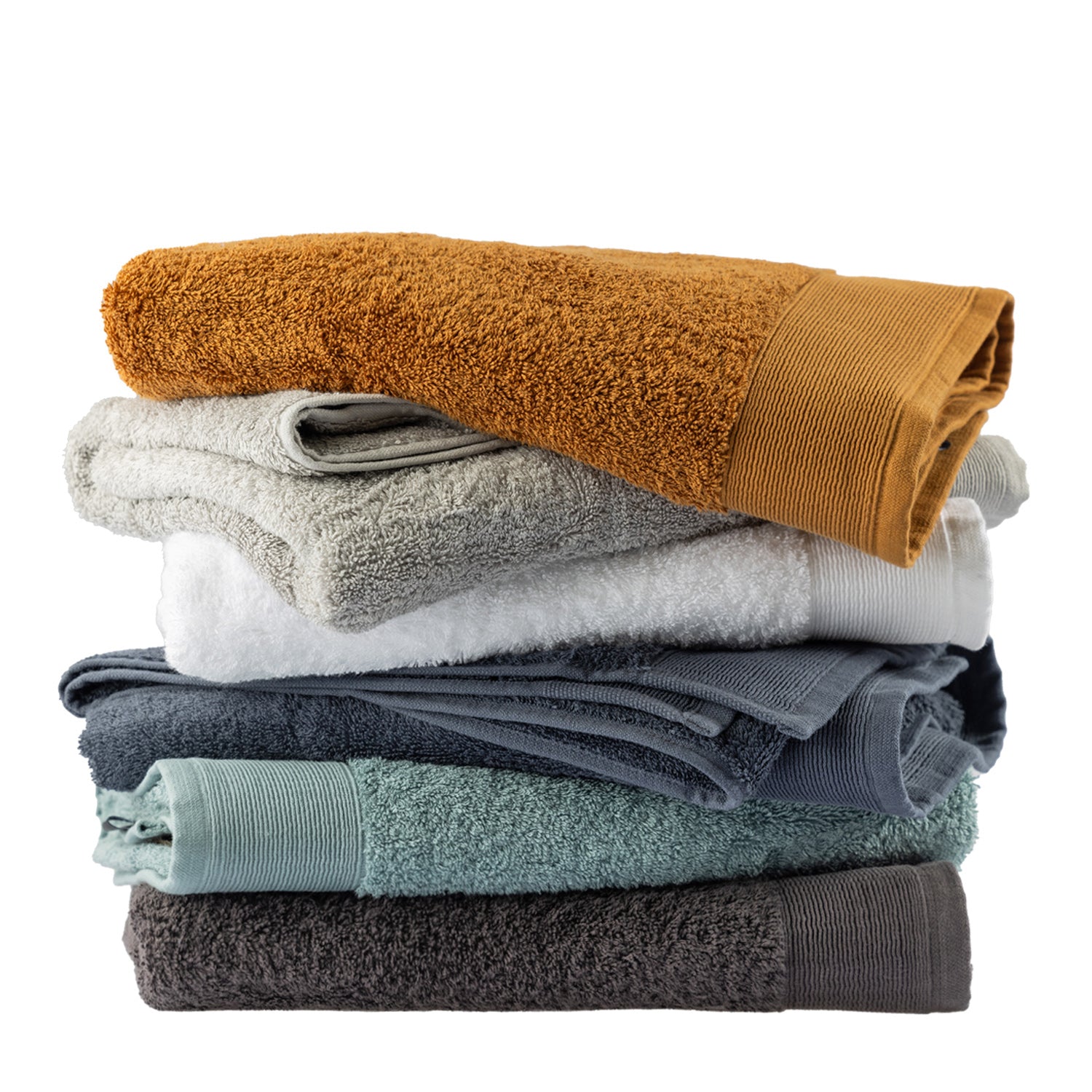 Stack of Egyptian cotton bath sheets in Marigold, Silver, White, Diesel Blue, Marine and Charcoal colourways.