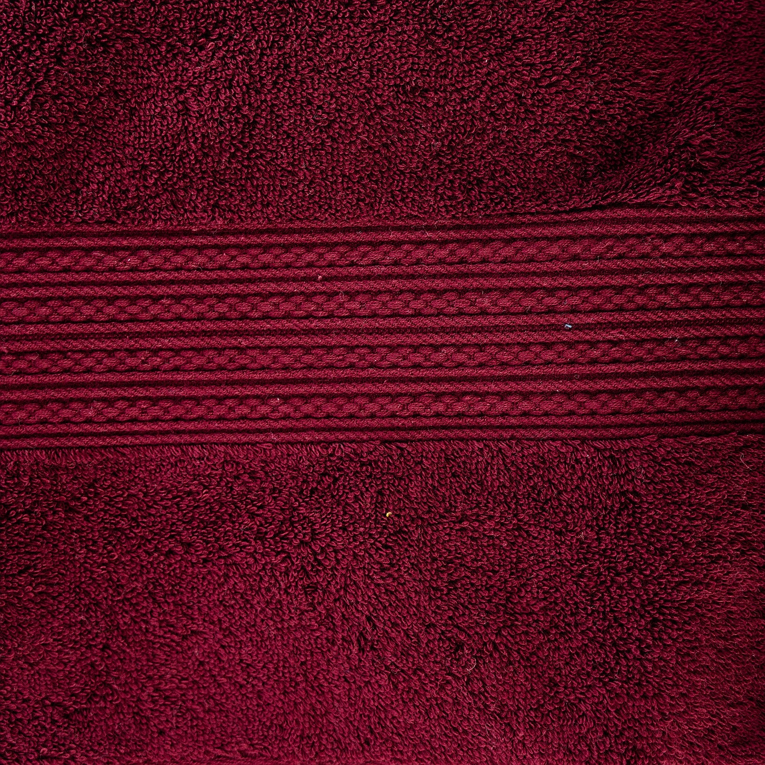 Close-up of a maroon fabric with texture