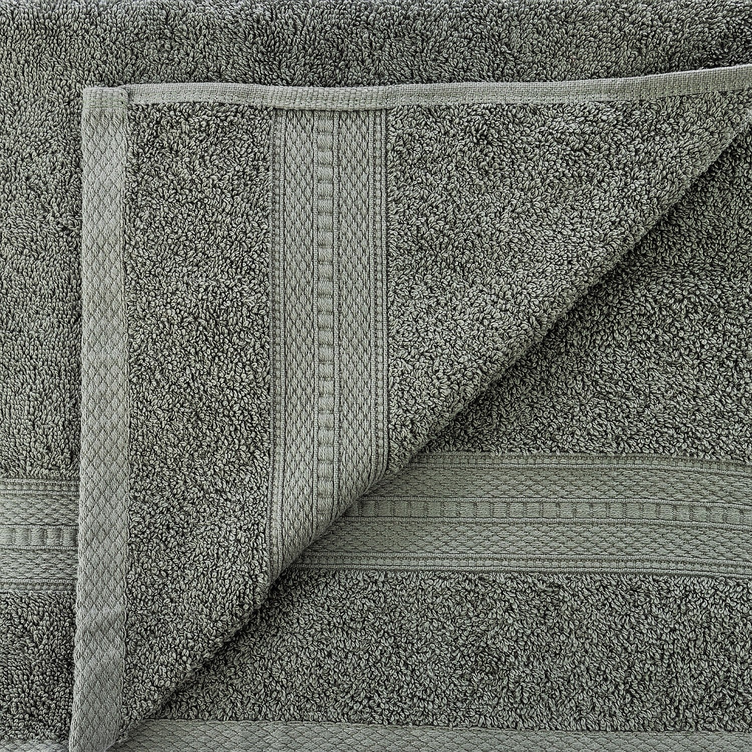 Close-up of a textured gray towel with intricate patterns.