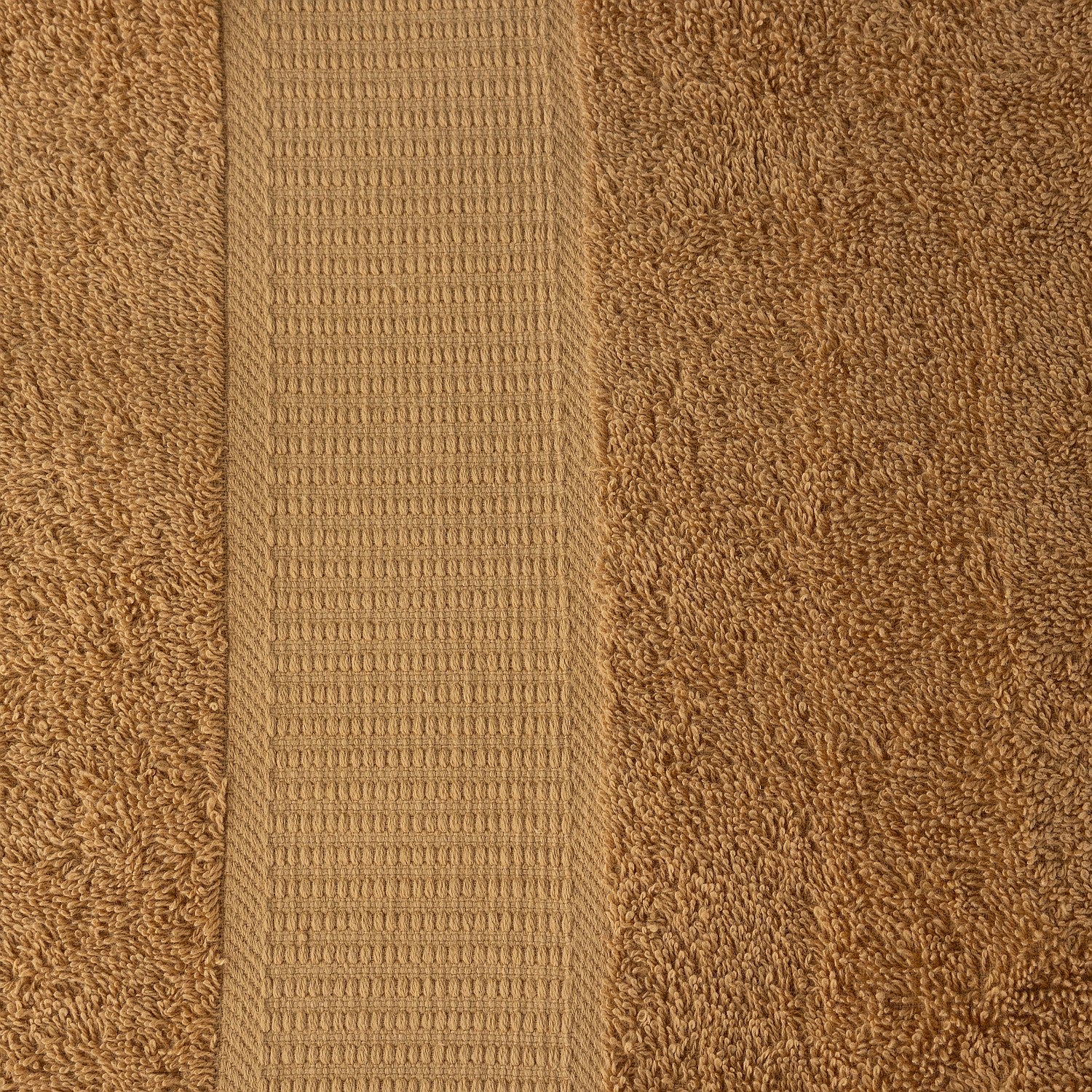 Close-up of brown textured fabric with a subtle pattern