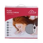 Box of Cloud9 plush heated throw with a woman using it on a white background