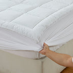 Close up of Cluster Puff Mattress Topper corner to show the fully fitted design 