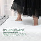 Person standing on the mattress surface to demonstrate zero motion transfer technology and pressure-absorbing comfort support.