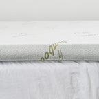 The bambou mattress topper on bed close up.